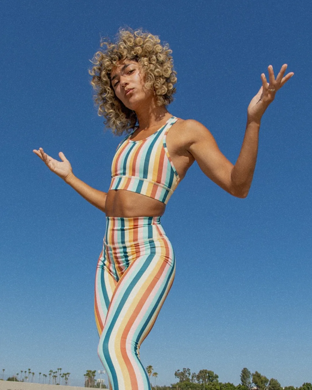 waste2wear-recycled-polyester-activewear-set Striped activewear set made from recycled polyester